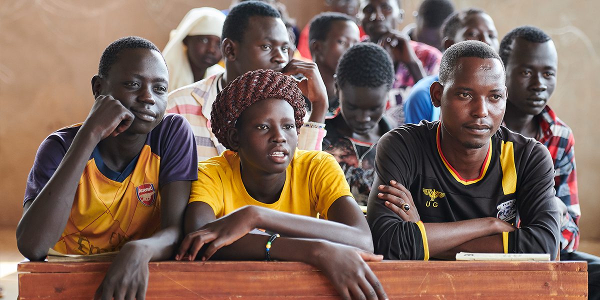 Students in an English class in the Arrupe Learning Center, run by JRS in Bunj, South Sudan. Participants come from four refugee camps in Maban County that together shelter more than 130,000 refugees from the Blue Nile region of Sudan, along with local residents from the host community.
