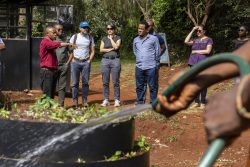 JRS staff visiting a Shamba (orchard) in Kenya