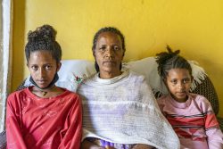 Abebe with the two girls t their home in Addis